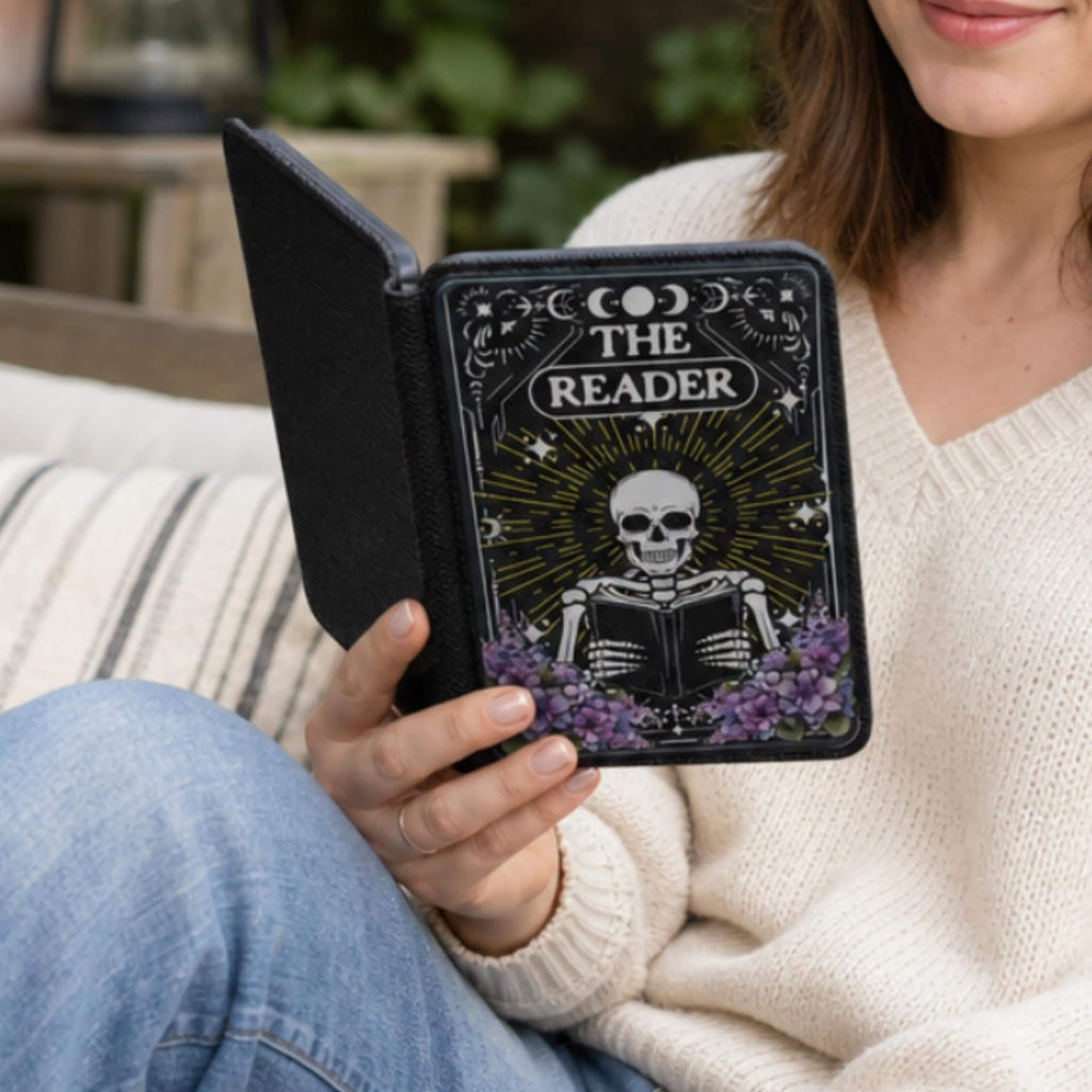 Book Lover Gift Kindle Paperwhite Case Skeleton Reader Design Tarot Inspired Artwork Celestial Moon Star Pattern Magnetic Closure Hand Strap Protective E-Reader Cover Purple Floral Accents Literary Themed Accessory Comfortable One Handed
